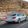 <p>Die Heckpartie des BMW 4er Grand Coupé in einer Fahraufnahme</p>