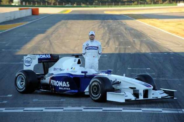 Tuesday, 20 January 2009 Valencia, Spain. The roll out of the BMW Sauber F1.09 BMW Sauber F1 Team driver Nick Heidfeld (GER) with the new car. This image is copyright free for editorial use © BMW AG